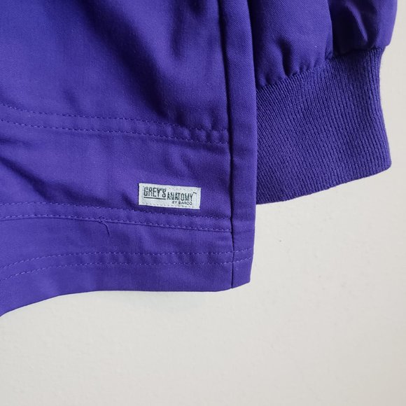 Grey's Anatomy Jamie 4-Pocket Round Neck Snap Front Warm Up Purple Scrub Jacket - Picture 4 of 8